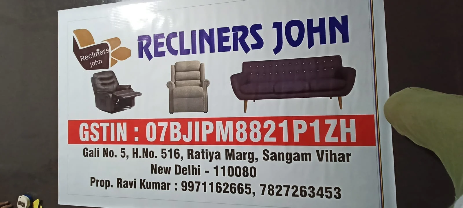 Recliners John business sign
